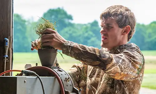 student exploring nature